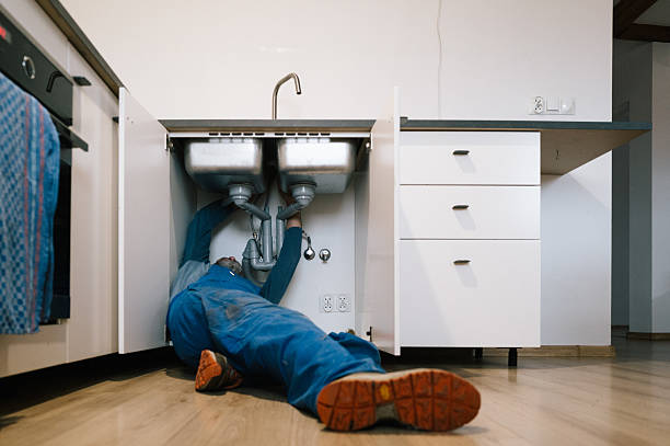 Professional Drain Cleaning technician working in Milford, MA